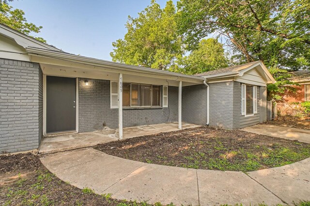 7805 Whitney Dr, White Settlement, TX 76108 - entrance to property featuring brick siding