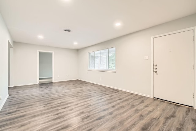 7805 Whitney Dr, White Settlement, TX 76108 - unfurnished living room with wood finished floors, recessed lighting, and baseboards