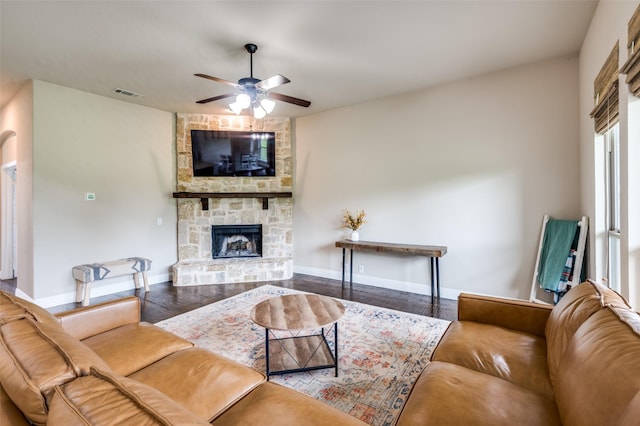 120 Crystal Creek Ln, Mckinney, TX 75071 - living room featuring ceiling fan, wood finished floors, a fireplace, and baseboards