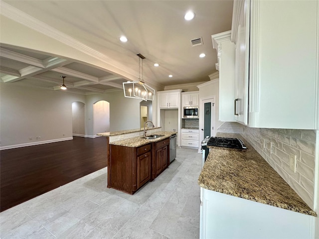 723 Dumaine Dr, Bossier City, LA 71111 - kitchen with stainless steel appliances, a sink, arched walkways, recessed lighting, and ornamental molding