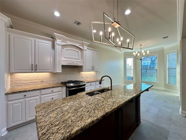 723 Dumaine Dr, Bossier City, LA 71111 - kitchen featuring a sink, gas range, a chandelier, tasteful backsplash, and crown molding