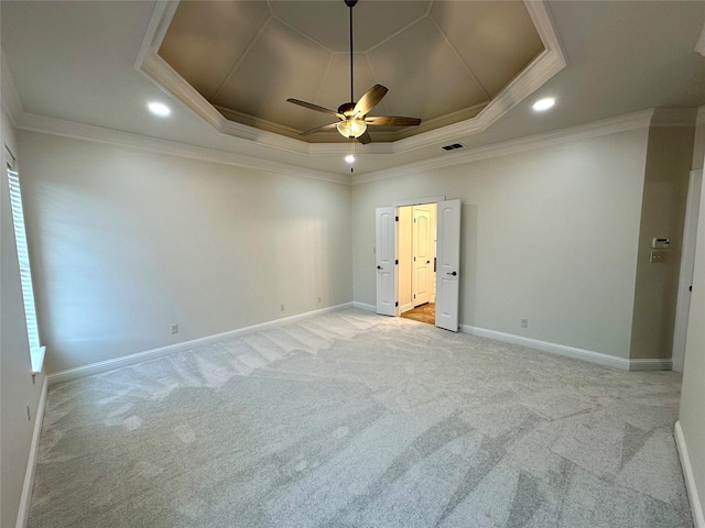 723 Dumaine Dr, Bossier City, LA 71111 - unfurnished room with a raised ceiling, light carpet, ceiling fan, crown molding, and baseboards