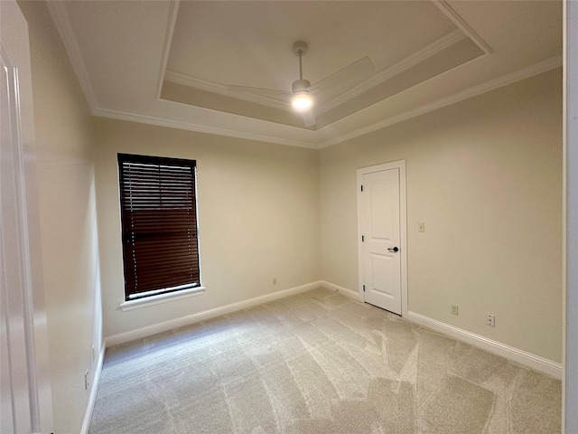 723 Dumaine Dr, Bossier City, LA 71111 - empty room with a tray ceiling, light carpet, ornamental molding, ceiling fan, and baseboards
