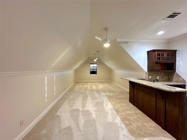 723 Dumaine Dr, Bossier City, LA 71111 - bonus room with ceiling fan, baseboards, vaulted ceiling, and light carpet
