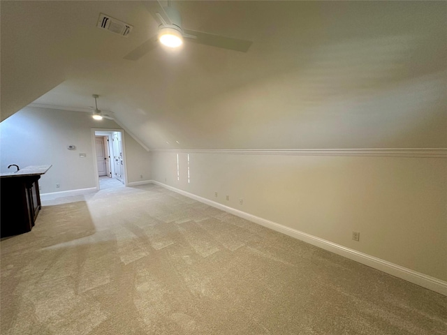 723 Dumaine Dr, Bossier City, LA 71111 - bonus room with ceiling fan, baseboards, vaulted ceiling, and light carpet