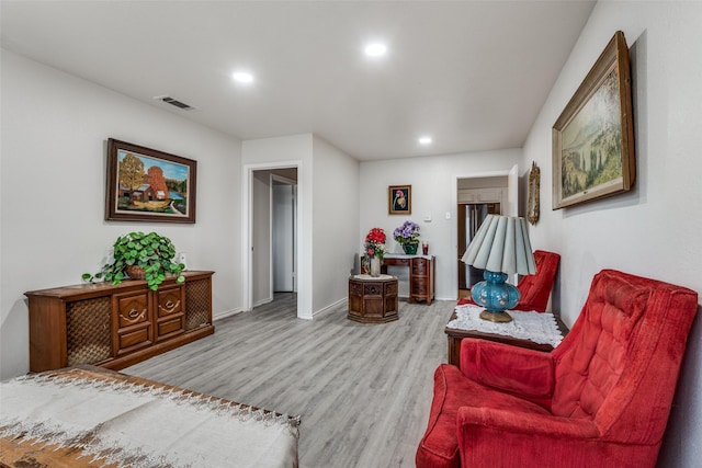 1859 Greendale Dr, Dallas, TX 75217 - living area featuring recessed lighting, wood finished floors, and baseboards