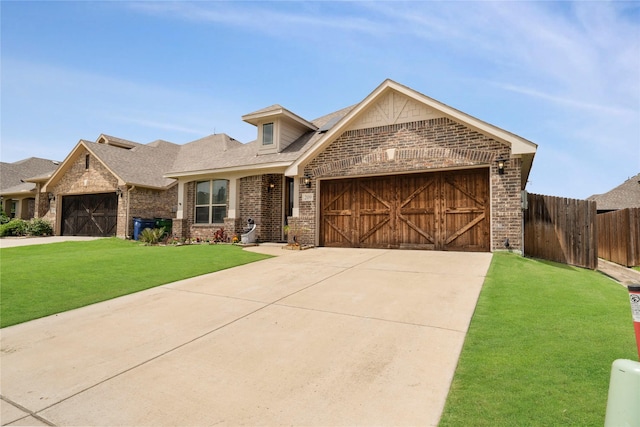 view of front of house featuring brick siding, an attached garage, driveway, and a shingled roof