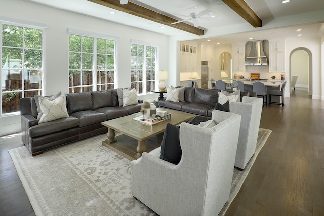 3205 Caruth Blvd, University Park, TX 75225 - living room featuring arched walkways, a ceiling fan, beamed ceiling, recessed lighting, and dark wood-style flooring