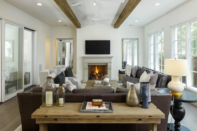 3205 Caruth Blvd, University Park, TX 75225 - living room with dark wood-type flooring, beamed ceiling, a lit fireplace, ceiling fan, and recessed lighting