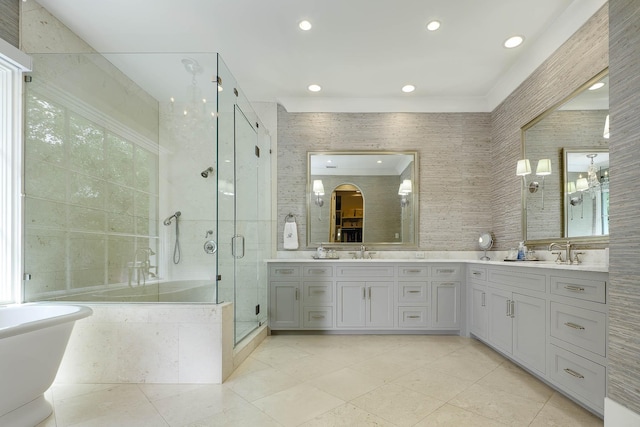 3205 Caruth Blvd, University Park, TX 75225 - full bathroom with a soaking tub, a shower stall, recessed lighting, double vanity, and tile patterned flooring