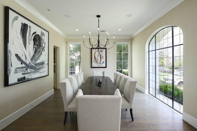 3205 Caruth Blvd, University Park, TX 75225 - dining space featuring a chandelier, healthy amount of natural light, crown molding, wood finished floors, and baseboards