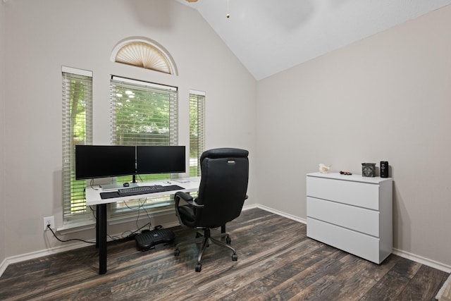 home office with healthy amount of natural light, dark wood-style floors, ceiling fan, baseboards, and high vaulted ceiling