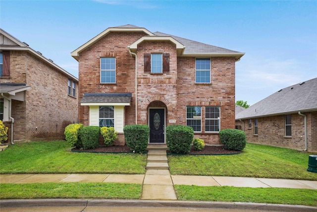 3513 San Lucas Ln, Denton, TX 76208 - traditional-style house featuring brick siding, a front lawn, and cooling unit