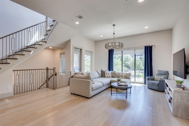 7704 Highcroft Way, Plano, TX 75024 - living room with light wood-type flooring, a chandelier, and recessed lighting