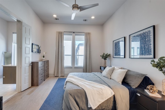 7704 Highcroft Way, Plano, TX 75024 - bedroom with light wood finished floors, ceiling fan, and recessed lighting