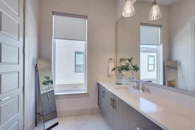 7704 Highcroft Way, Plano, TX 75024 - bathroom featuring marble look tile flooring, vanity, and baseboards