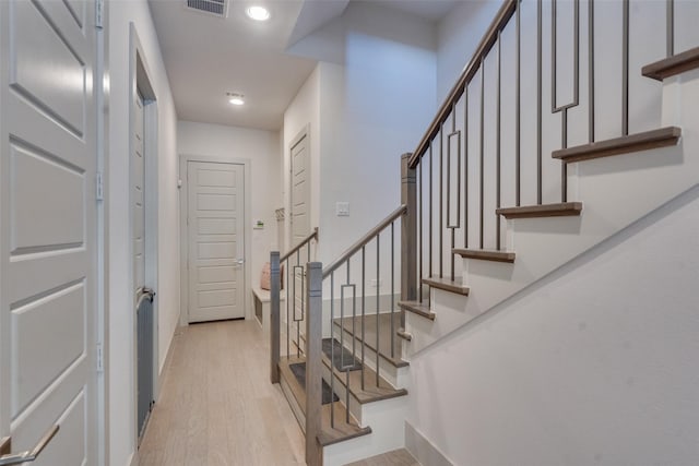 7704 Highcroft Way, Plano, TX 75024 - foyer with light wood-type flooring, stairway, baseboards, and recessed lighting