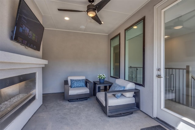7704 Highcroft Way, Plano, TX 75024 - view of patio with a ceiling fan and a glass covered fireplace