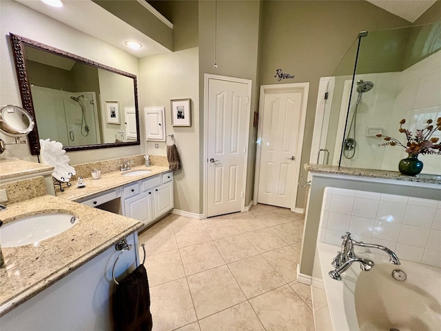 321 Fairway Meadows Dr, Garland, TX 75044 - full bath featuring a stall shower, tile patterned floors, a garden tub, vanity, and baseboards