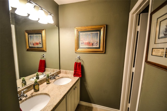 321 Fairway Meadows Dr, Garland, TX 75044 - bathroom featuring double vanity and tile patterned floors