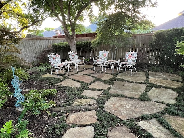 321 Fairway Meadows Dr, Garland, TX 75044 - view of patio with a fenced backyard