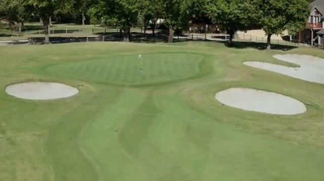 321 Fairway Meadows Dr, Garland, TX 75044 - view of community featuring an area to practice putting and view of golf course