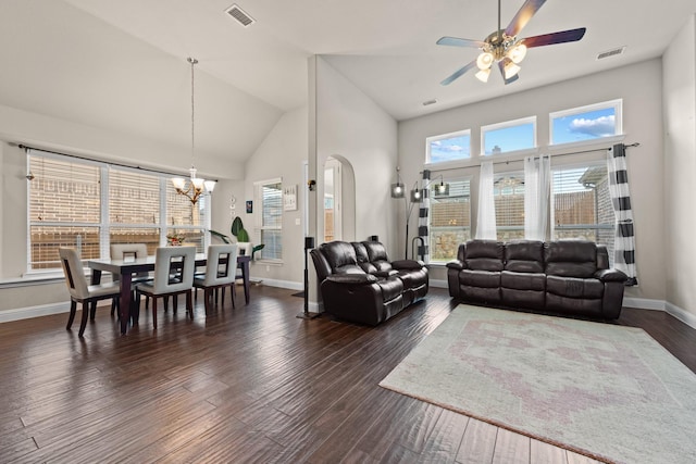 2444 Kingsgate Dr, Little Elm, TX 75068 - living room featuring a ceiling fan, a chandelier, dark wood finished floors, baseboards, and high vaulted ceiling