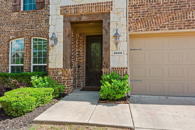 2444 Kingsgate Dr, Little Elm, TX 75068 - entrance to property with brick siding and stone siding
