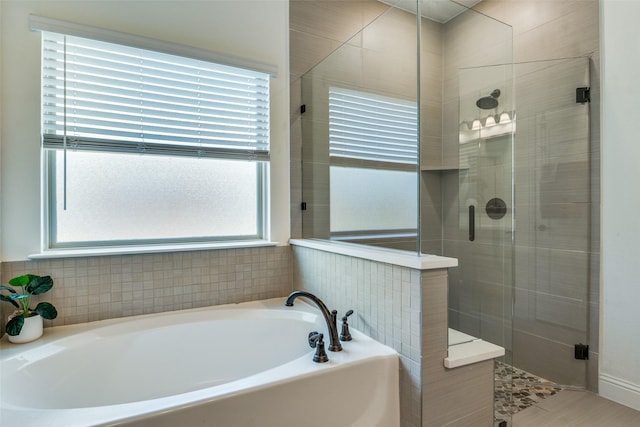 1839 Tuscany Dr, Mclendon Chisholm, TX 75032 - full bathroom with tiled shower and a garden tub