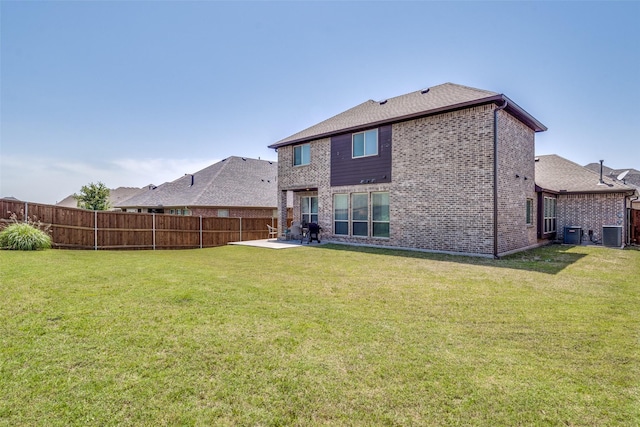 1839 Tuscany Dr, Mclendon Chisholm, TX 75032 - back of property with brick siding, central air condition unit, and a patio area