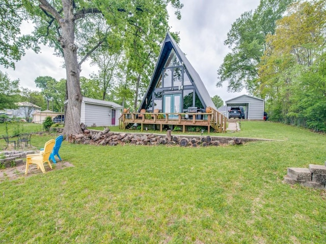 467 Old Mill Ln, East Tawakoni, TX 75472 - back of house with a deck, an outdoor structure, and a yard