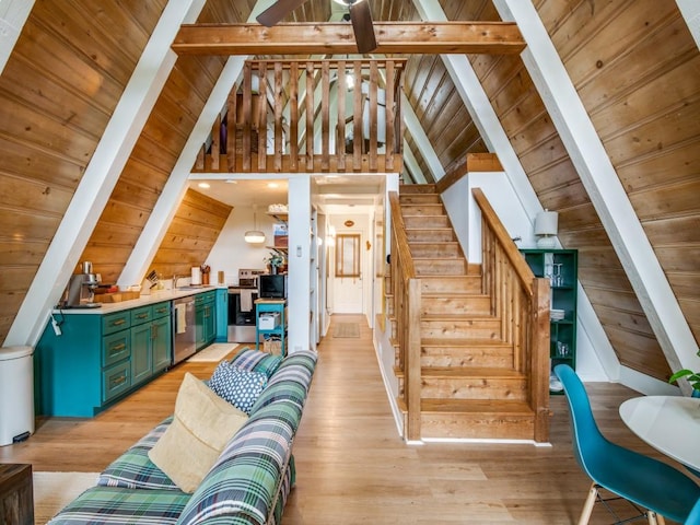 467 Old Mill Ln, East Tawakoni, TX 75472 - living area with light wood finished floors, wood ceiling, and stairway