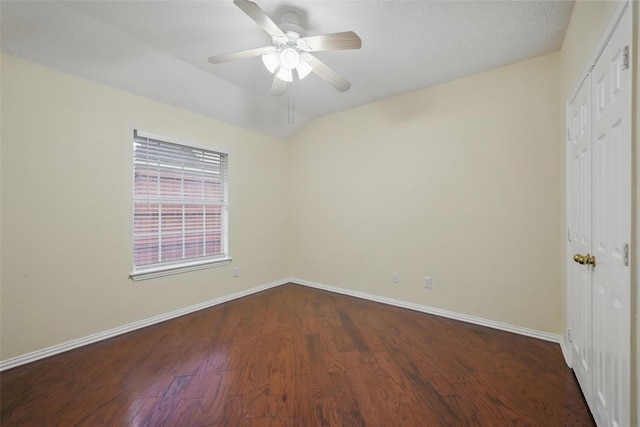 4416 Heath Ct, Plano, TX 75024 - spare room featuring dark wood finished floors, baseboards, and ceiling fan