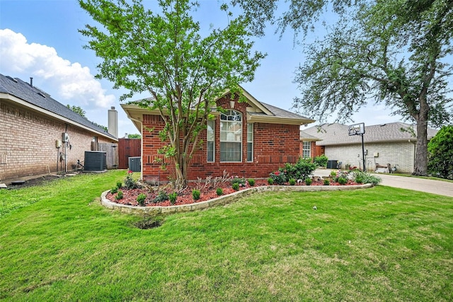 4416 Heath Ct, Plano, TX 75024 - view of front of home with brick siding and central AC unit