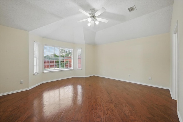 4416 Heath Ct, Plano, TX 75024 - unfurnished room with wood finished floors, a ceiling fan, baseboards, lofted ceiling, and a textured ceiling