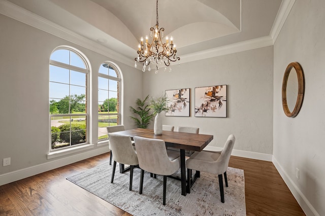 1665 Florence Rd, Keller, TX 76262 - dining area with baseboards, a chandelier, ornamental molding, vaulted ceiling, and wood finished floors