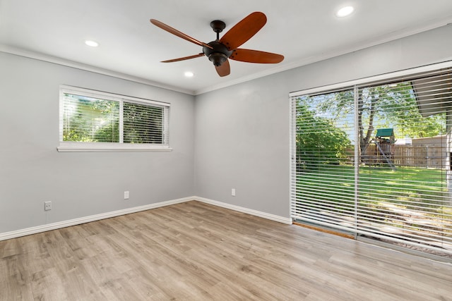 723 Westover Dr, Richardson, TX 75080 - spare room with plenty of natural light, crown molding, a ceiling fan, wood finished floors, and baseboards