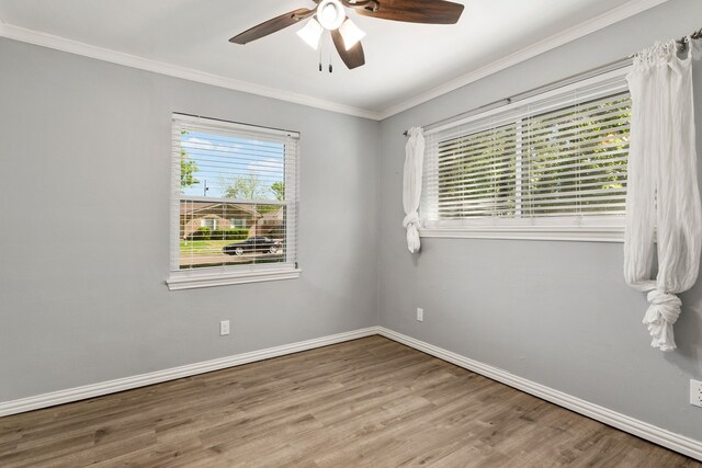 723 Westover Dr, Richardson, TX 75080 - unfurnished room featuring wood finished floors, baseboards, ornamental molding, and ceiling fan