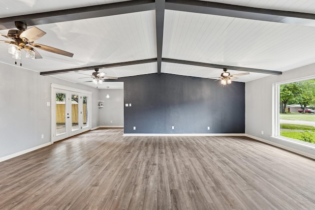 723 Westover Dr, Richardson, TX 75080 - unfurnished living room with baseboards, wood finished floors, french doors, and a ceiling fan