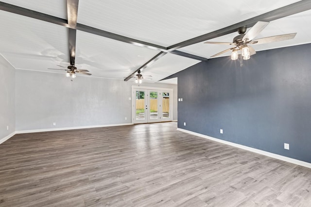 723 Westover Dr, Richardson, TX 75080 - unfurnished living room featuring ceiling fan, baseboards, and wood finished floors