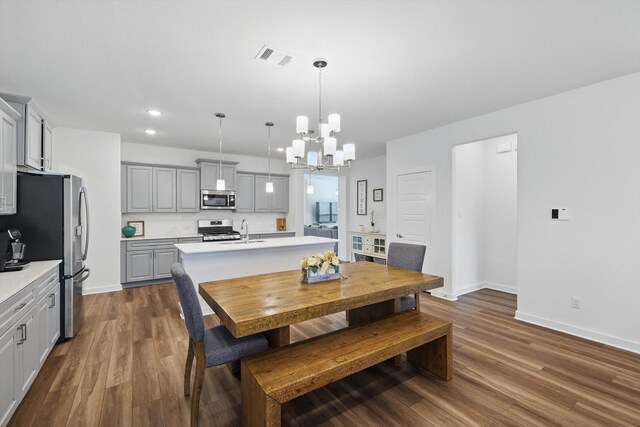 1837 Sebright Trl, Fort Worth, TX 76052 - dining area with a chandelier, dark wood-style floors, baseboards, and recessed lighting