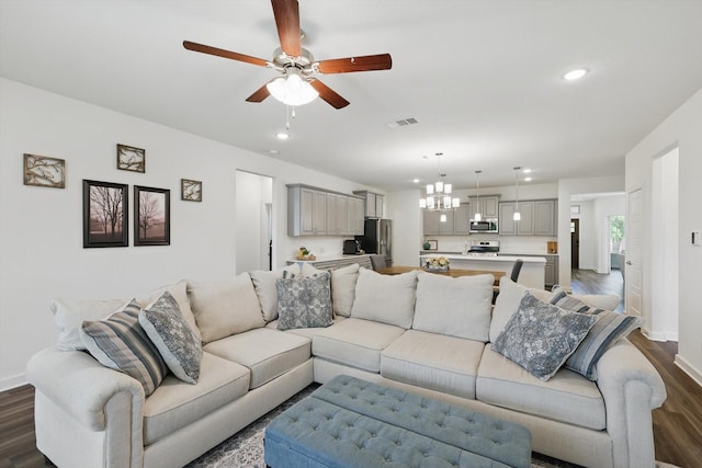 1837 Sebright Trl, Fort Worth, TX 76052 - living area with a chandelier, dark wood-style flooring, a ceiling fan, recessed lighting, and baseboards