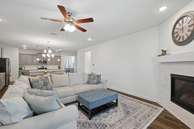 1837 Sebright Trl, Fort Worth, TX 76052 - living area with recessed lighting, a ceiling fan, a chandelier, dark wood-style flooring, and baseboards