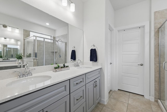 1837 Sebright Trl, Fort Worth, TX 76052 - bathroom with a stall shower, double vanity, and tile patterned flooring