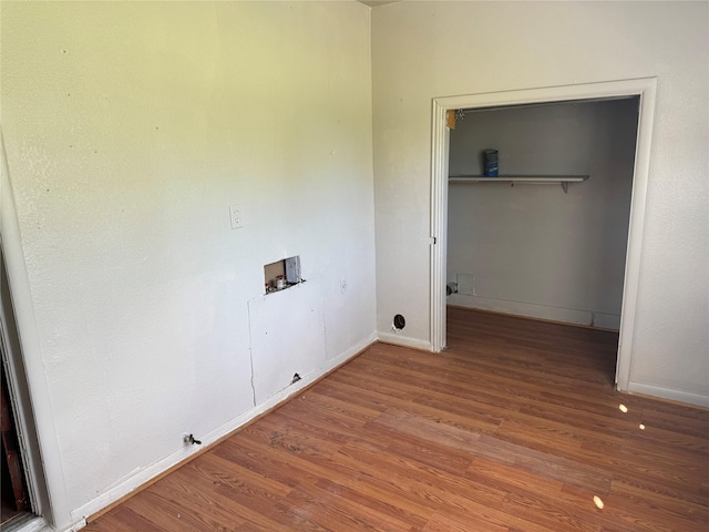 425 S 1st St W, Clyde, TX 79510 - washroom with washer hookup, wood finished floors, hookup for a gas dryer, and baseboards