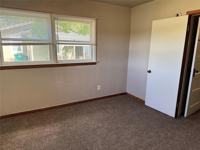 425 S 1st St W, Clyde, TX 79510 - carpeted spare room with baseboards