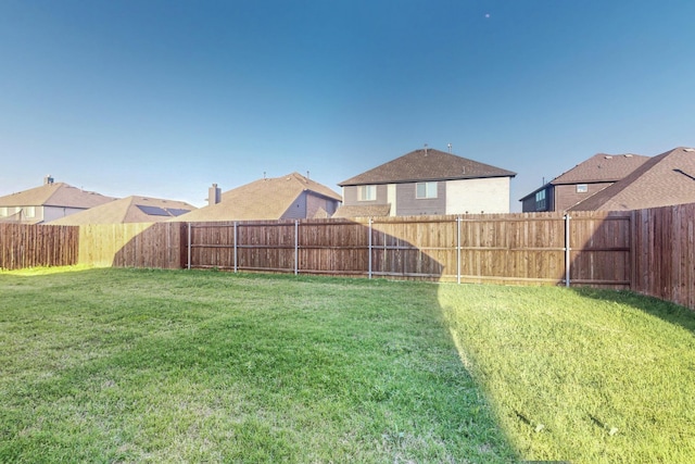 view of yard with a residential view