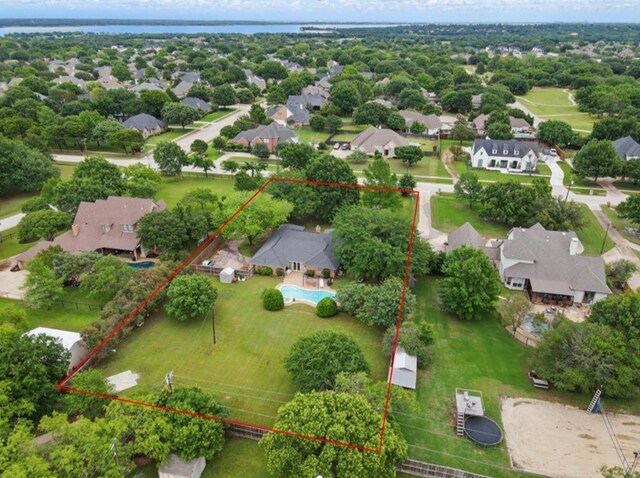 2606 N Carroll Ave, Southlake, TX 76092 - aerial perspective of suburban area featuring property boundaries highlighted and a nearby body of water