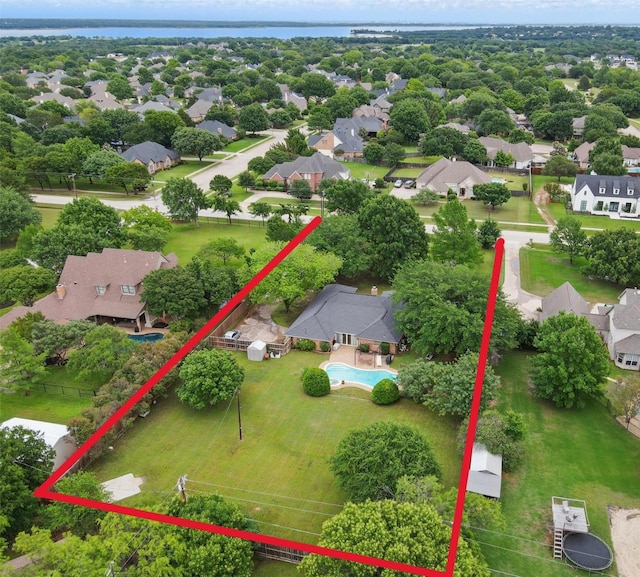 2606 N Carroll Ave, Southlake, TX 76092 - aerial view of residential area featuring property parcel outlined and a nearby body of water