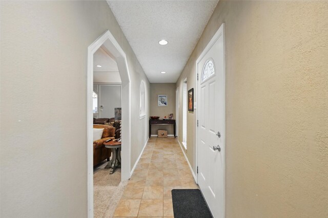 2606 N Carroll Ave, Southlake, TX 76092 - corridor with recessed lighting, light tile patterned flooring, baseboards, and a textured wall